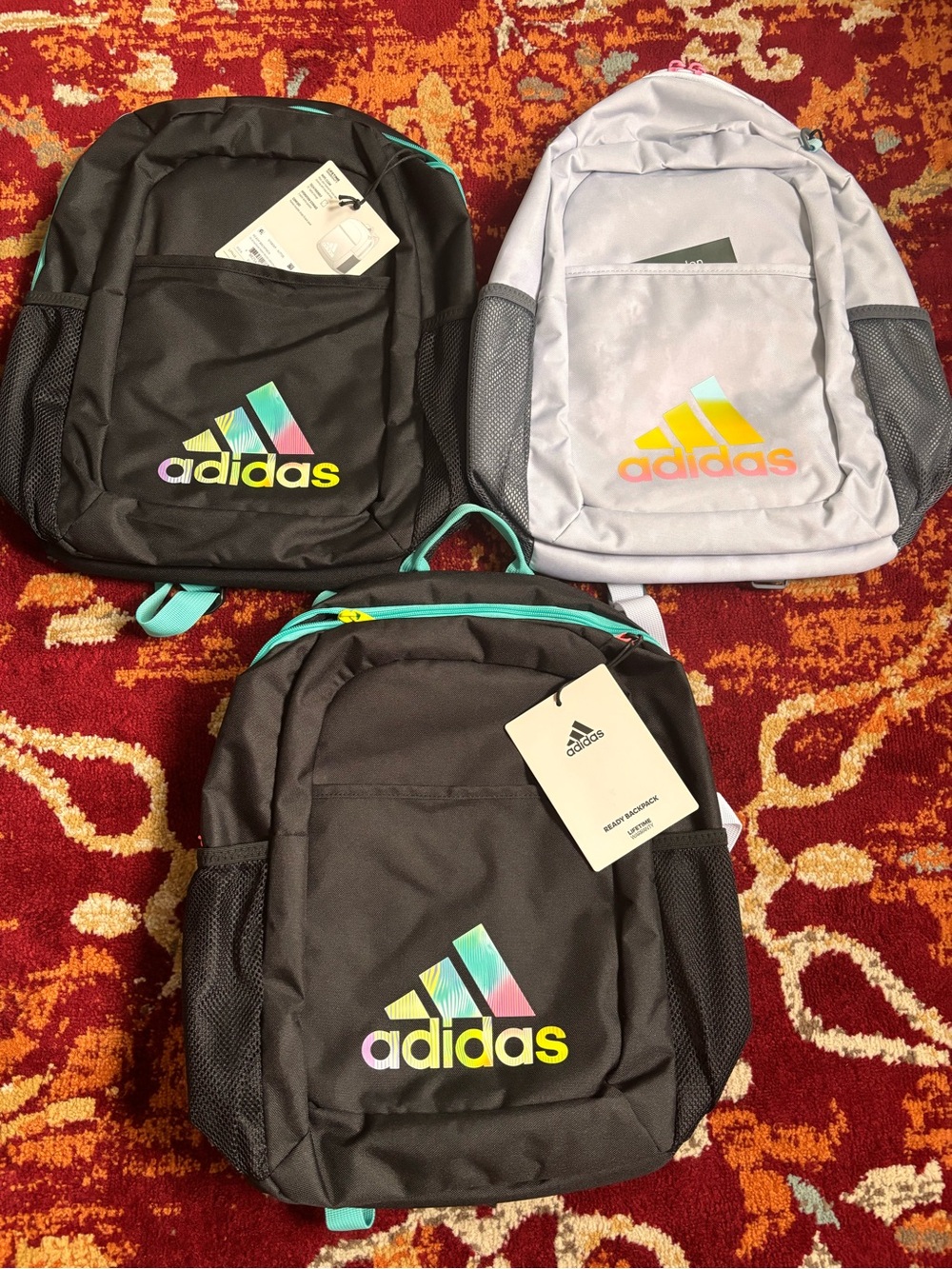 adidas Black Backpack with Teal Trim and Straps